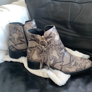 Women’s faux snakeskin booties